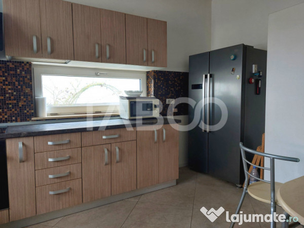 Casa individuala 4 camere P+1E 118 mp cu teren Cisnadie 