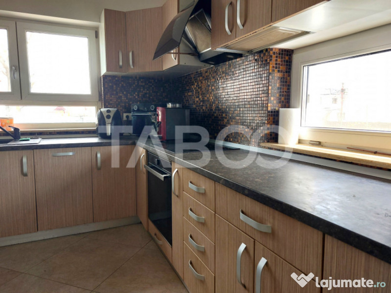 Casa individuala 4 camere P+1E 118 mp cu teren Cisnadie 