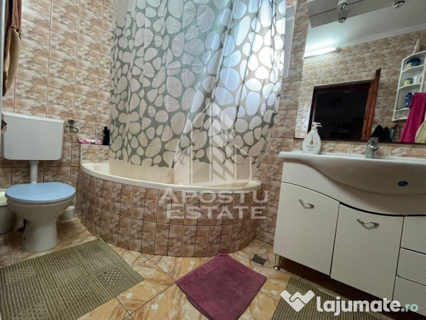 Casa individuala,3 camere, 2 bai, acces auto, garaj,teren...