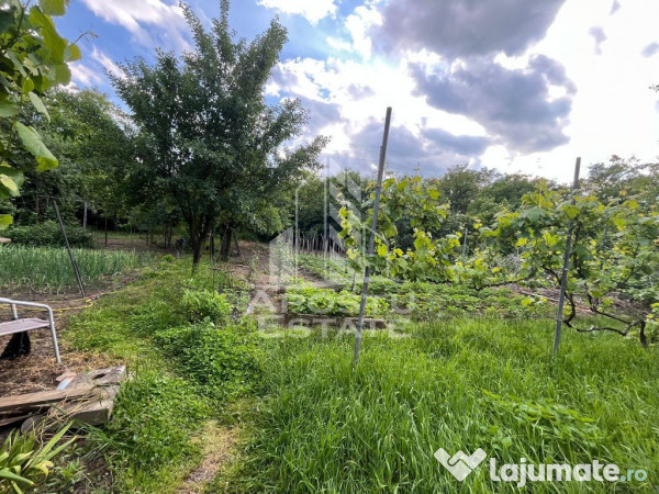 Casa individuala,3 camere, 2 bai, acces auto, garaj,teren...