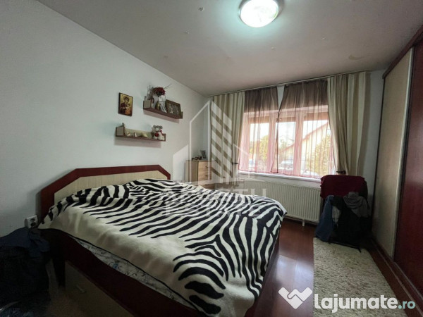 Casa individuala,3 camere, 2 bai, acces auto, garaj,teren...