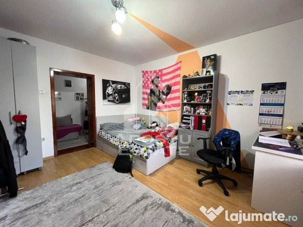 Casa individuala,3 camere, 2 bai, acces auto, garaj,teren...