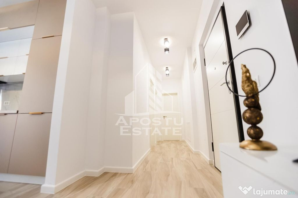 Apartament cu 3 camerere, mobilat de lux parcare subteran...