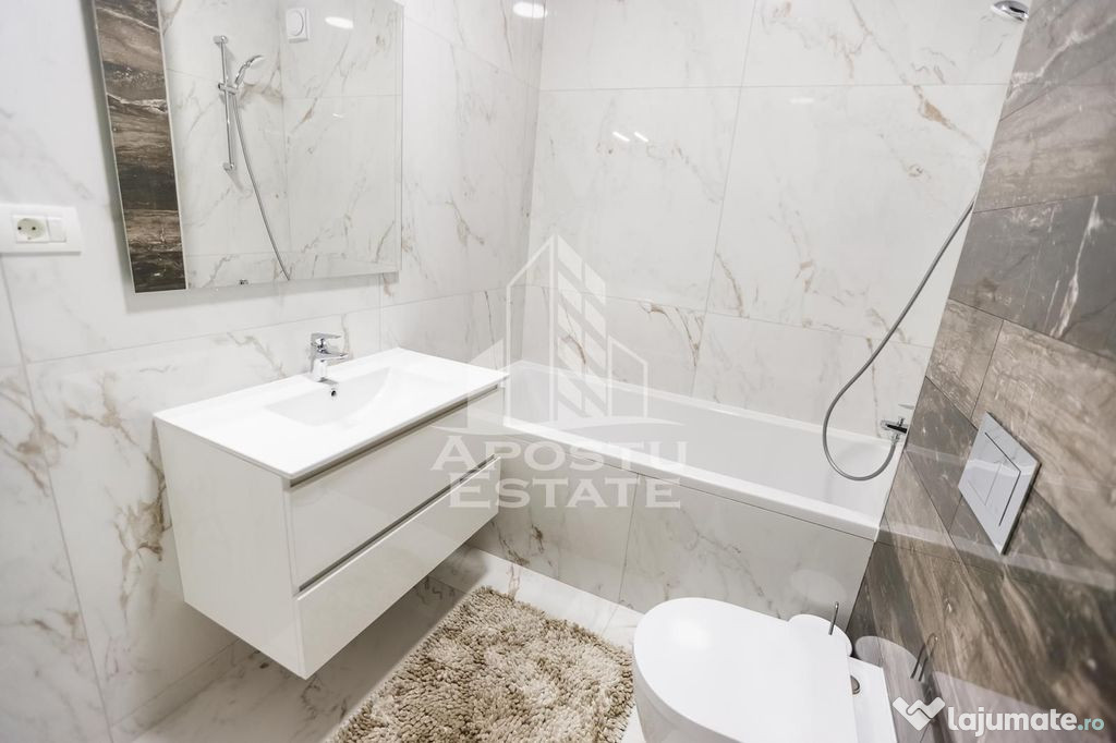 Apartament cu 3 camerere, mobilat de lux parcare subteran...