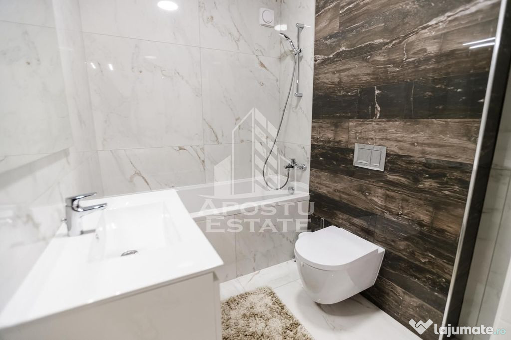 Apartament cu 3 camerere, mobilat de lux parcare subteran...