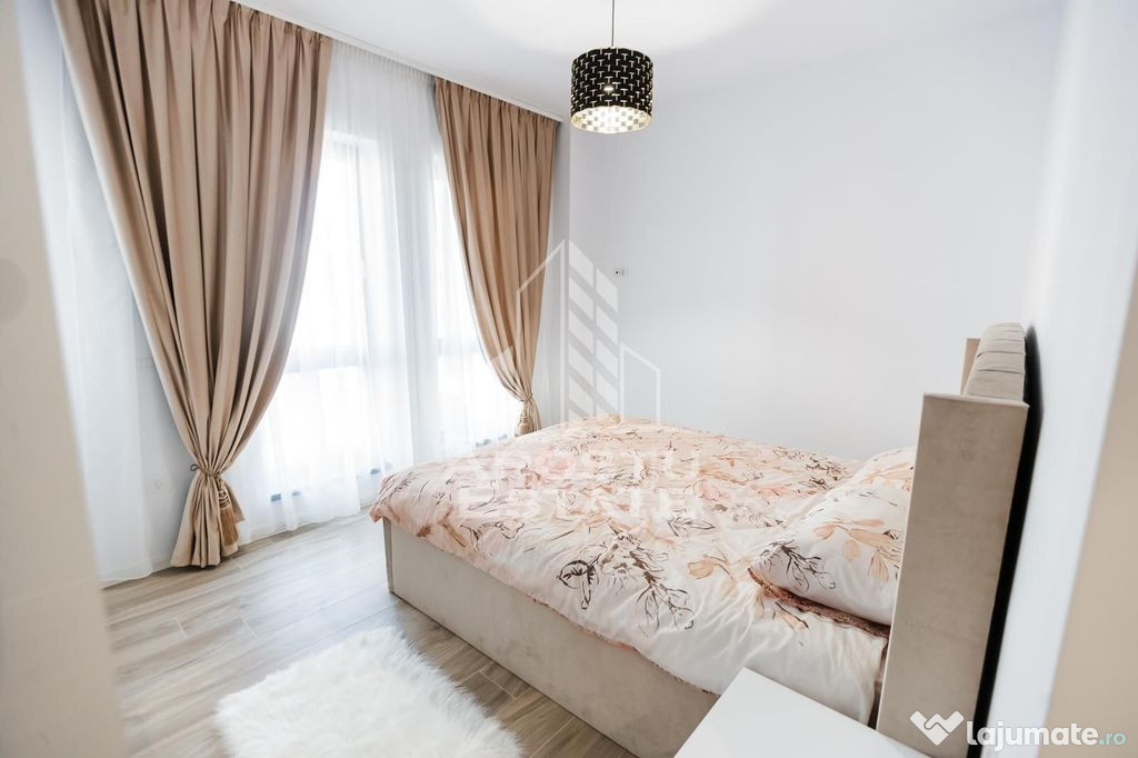 Apartament cu 3 camerere, mobilat de lux parcare subteran...