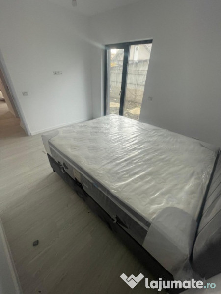 Apartament 2 camere cu curte proprie și 2 locuri de parcare 