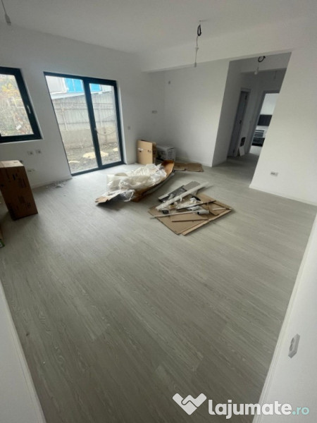 Apartament 2 camere cu curte proprie și 2 locuri de parcare 