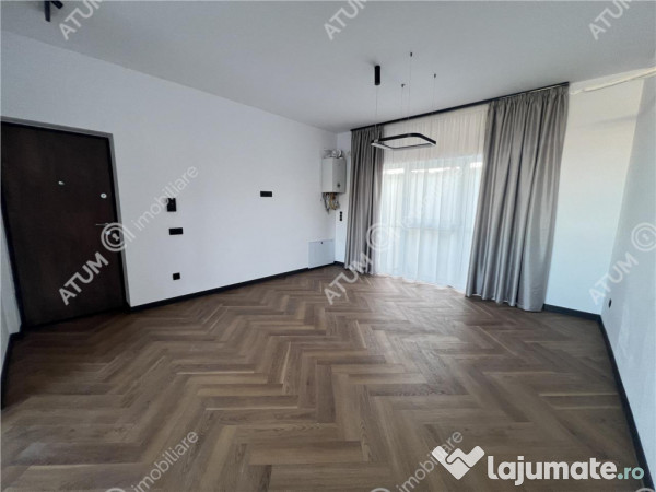 Apartament de 3 camere cu balcon si 2 locuri parcare zona Tu 