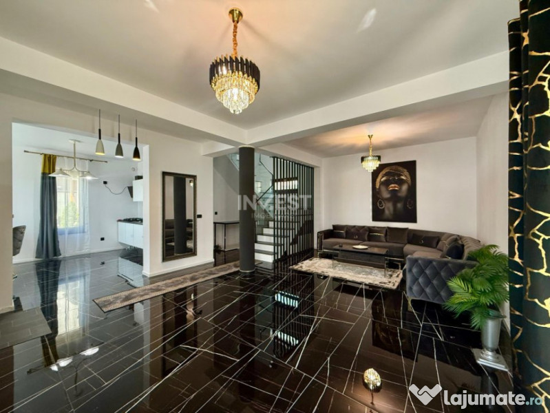 Vilă de vânzare cu design deosebit în cartierul Bucium 