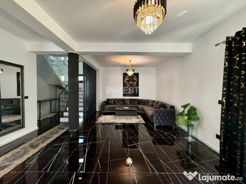 Vilă de vânzare cu design deosebit în cartierul Bucium 