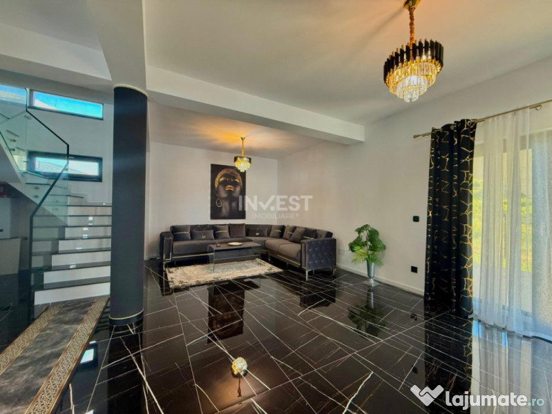 Vilă de vânzare cu design deosebit în cartierul Bucium 