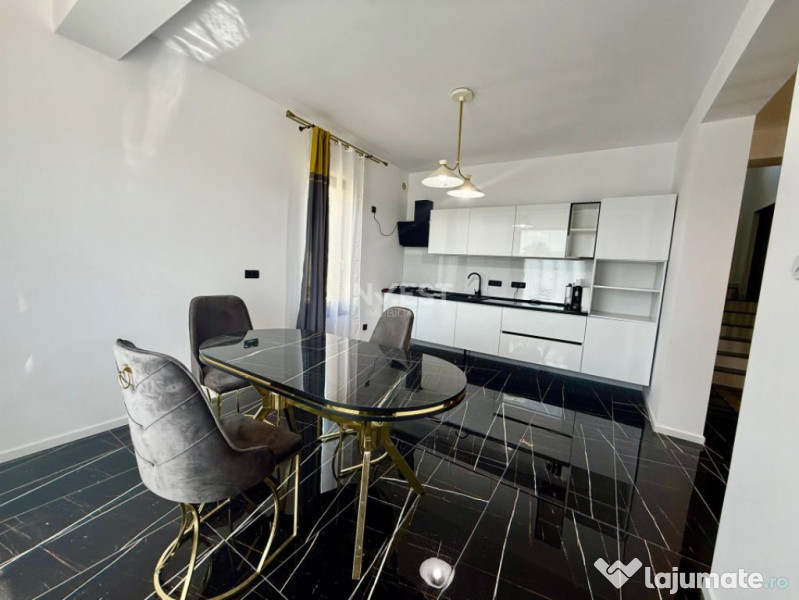 Vilă de vânzare cu design deosebit în cartierul Bucium 