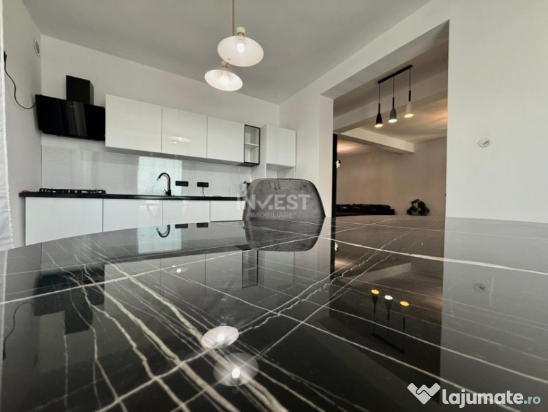 Vilă de vânzare cu design deosebit în cartierul Bucium 