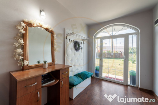 Casa cu teren generos si gradina spectaculoasa – Comuna Cu