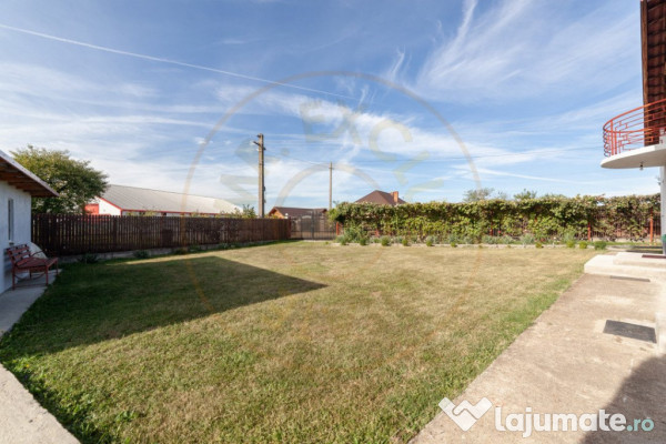 Casa cu teren generos si gradina spectaculoasa – Comuna Cu