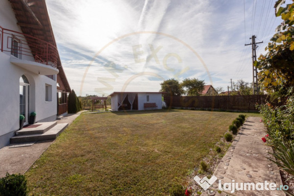 Casa cu teren generos si gradina spectaculoasa – Comuna Cu