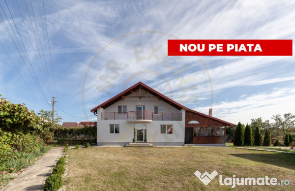 Casa cu teren generos si gradina spectaculoasa – Comuna Cu