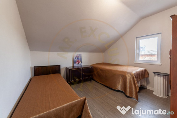 Casa cu teren generos si gradina spectaculoasa – Comuna Cu