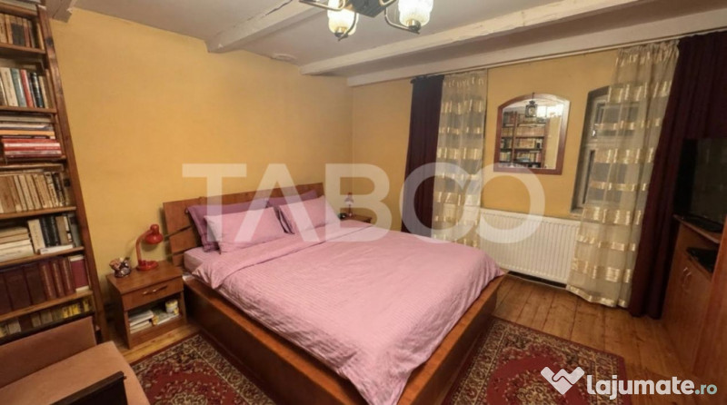 Casa de vanzare cu curte spatioasa loc relaxare si gradina C