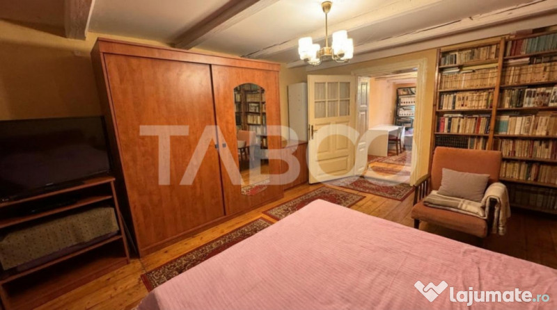 Casa de vanzare cu curte spatioasa loc relaxare si gradina C