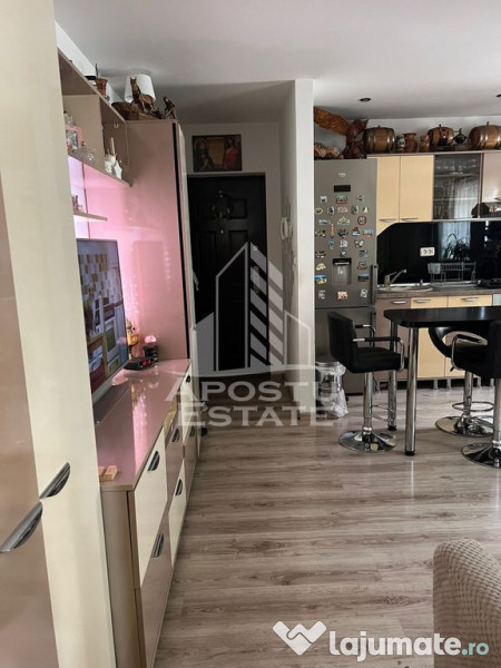 Apartament cu 2 camere complet mobilat si utilat la etaju... 
