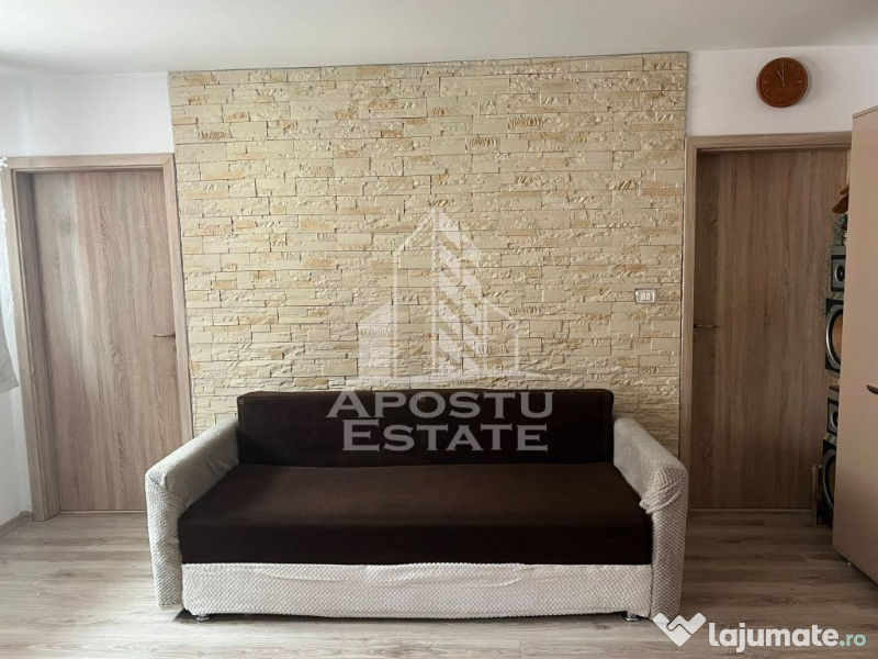 Apartament cu 2 camere complet mobilat si utilat la etaju... 