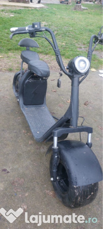 Scuter electric în stare bună de funcționare 