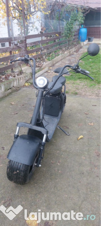 Scuter electric în stare bună de funcționare 