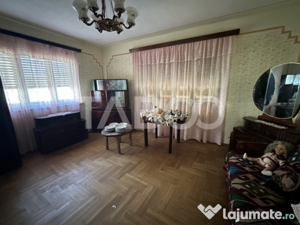 Casa cu potential de investitie 280 mp utili teren liber 206 