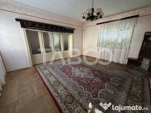Casa cu potential de investitie 280 mp utili teren liber 206 