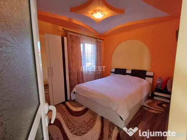 CASA CU 4 CAMERE , BECI SI GARAJ , 825MP TEREN , VOINESTI 