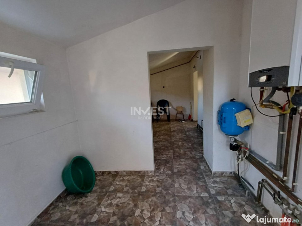 CASA CU 4 CAMERE , BECI SI GARAJ , 825MP TEREN , VOINESTI 