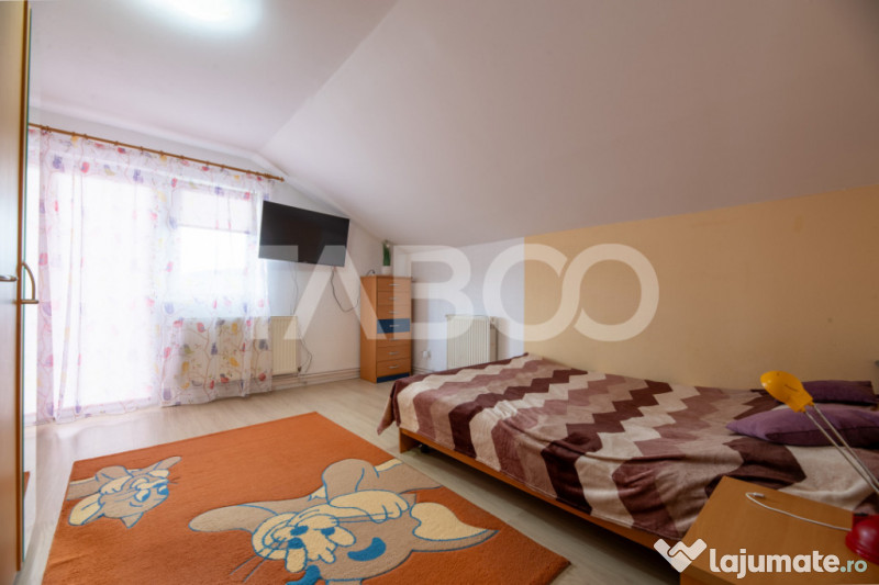 Casa de vanzare cu 4 dormitoare 2 bai si pivinita in Selimba 