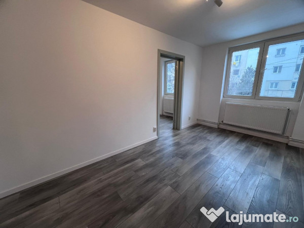 Apartament 2 camere,etaj1,zona Dacia 