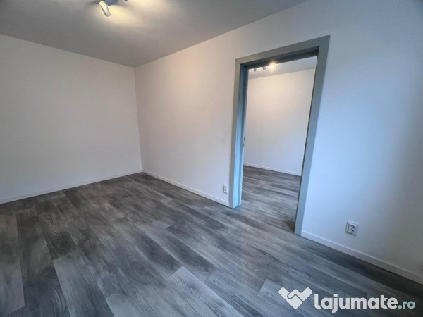 Apartament 2 camere,etaj1,zona Dacia 