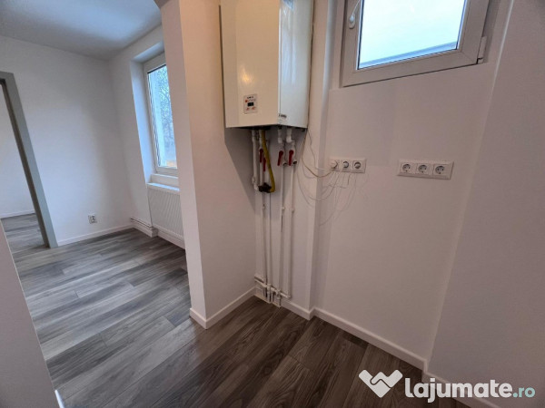 Apartament 2 camere,etaj1,zona Dacia 