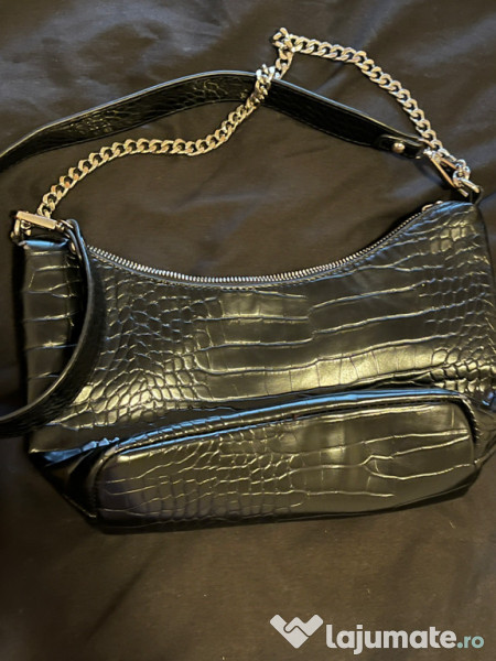 Poșetă nu este nouă 