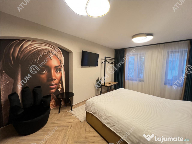 Apartament renovat cu 2 camere si terasa in zona Tribunei di 