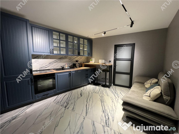 Apartament renovat cu 2 camere si terasa in zona Tribunei di 