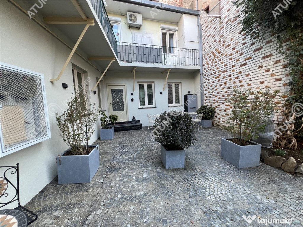 Apartament renovat cu 2 camere si terasa in zona Tribunei di 