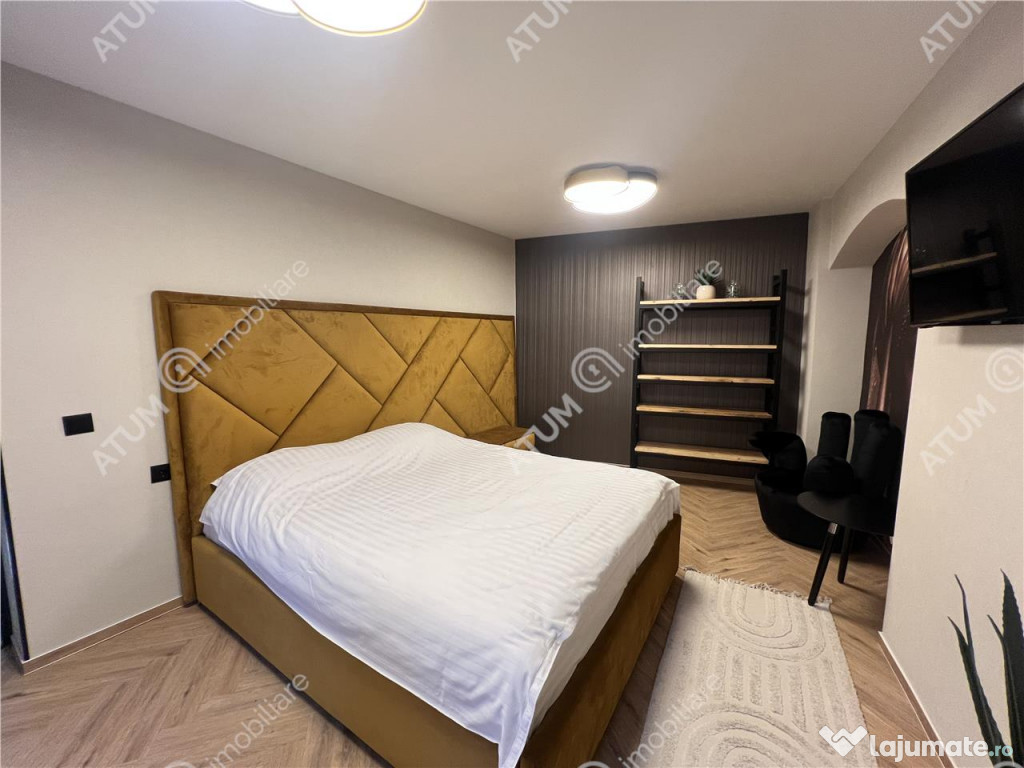 Apartament renovat cu 2 camere si terasa in zona Tribunei di 