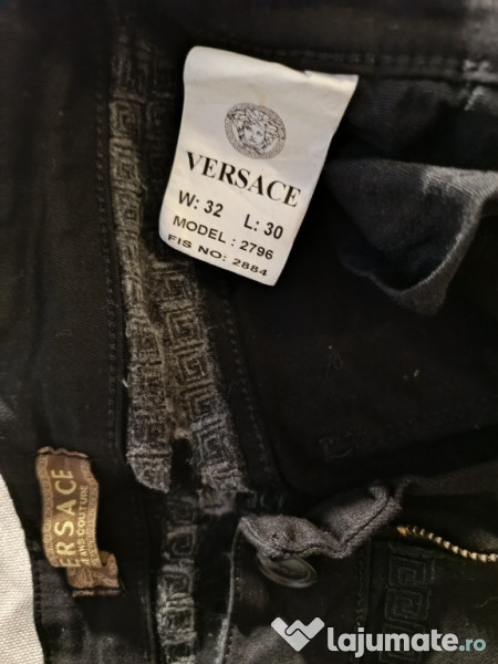 Blugi Versace în stare foarte bună 