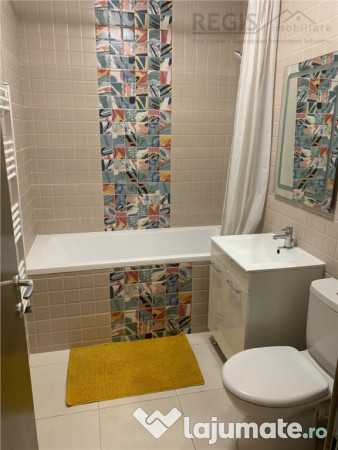 Apartament open space zona Tractorul/ loc de parcare 