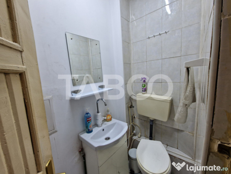 Apartament central 4 camere spatiu comercial garaj si pivnit 
