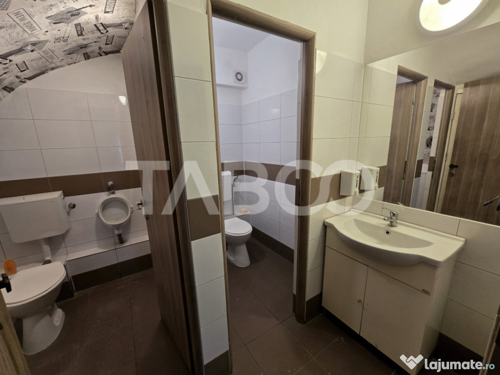 Spatiu comercial de vanzare 55 mp curte parcare zona Central 