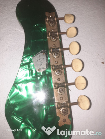 Chitara electronica cat si masina de cusut 