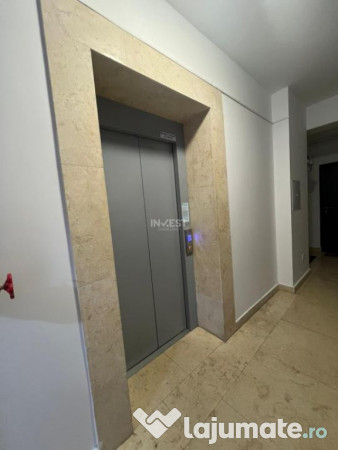 APARTAMENT CU 2 CAMERE , OPEN-SPACE, ETAJ INTERMEDIAR, CAPAT 