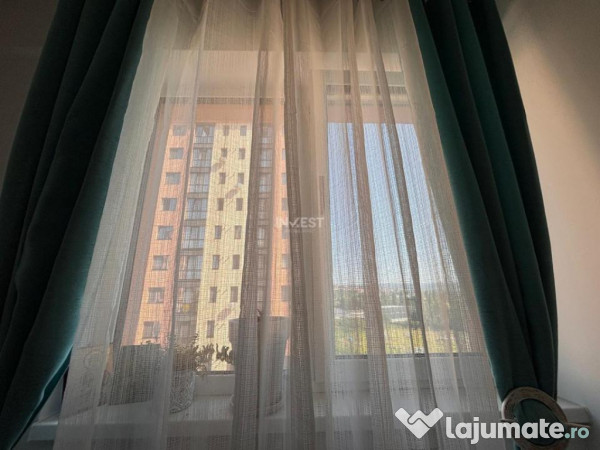APARTAMENT CU 2 CAMERE , OPEN-SPACE, ETAJ INTERMEDIAR, CAPAT 