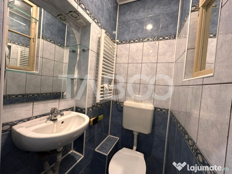 Apartament de vanzare cu garaj terasa 55 mpu zona Central Si